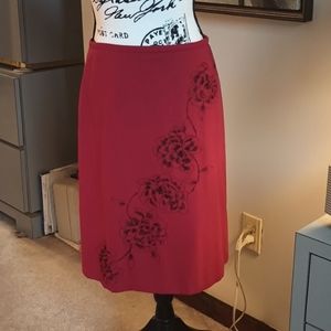 Loft Red Skirt With Black Floral Design on Front. Fully Lined. Size 6.